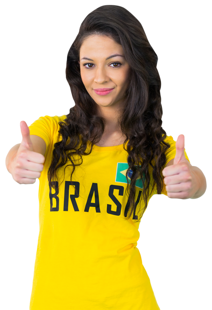 Cheerful Football Fan in Transparent Yellow Brazil T-Shirt Giving Thumbs Up - Download Free Stock Videos Pikwizard.com