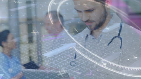 Caucasian Male Doctor Using Tablet with Digital Data Overlay