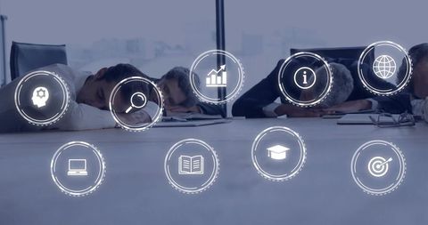 Executives napping in conference room with HUD icons floating over table, conveying workplace fatigu