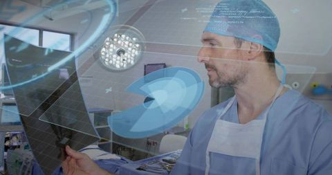 Surgeon reviewing radiographs with holographic interface in high-tech operating room
