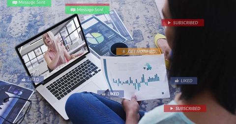 Remote analytics learning woman holding chart watching laptop with social notifications