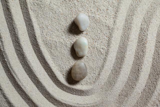 Zen garden with raked sand and stones - Download Free Stock Photos Pikwizard.com