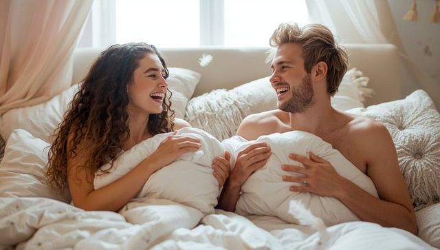Romantic Couple Enjoying Playful Morning In Cozy Bedroom