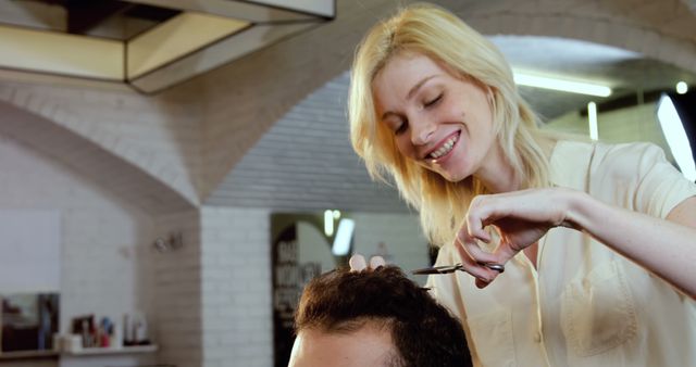 Female Hairstylist Cutting Client's Hair in Modern Salon - Download Free Stock Images Pikwizard.com