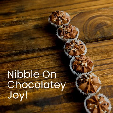 chocolate cupcakes row on wooden table celebrating indulgence - Download Free Stock Templates Pikwizard.com