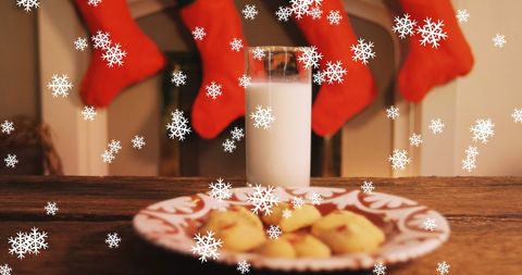 Christmas Milk and Cookies with Falling Snowflakes - Download Free Stock Images Pikwizard.com