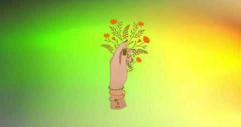 Hand offering orange wildflowers wearing boho bracelets on vibrant green yellow gradient