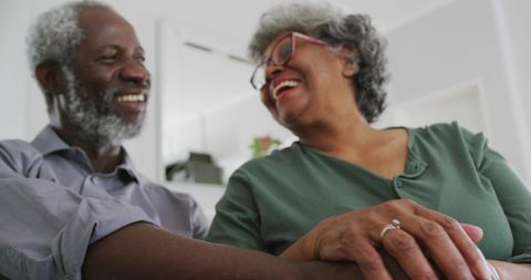 Senior Couple Laughing Together in Living Room - Download Free Stock Images Pikwizard.com