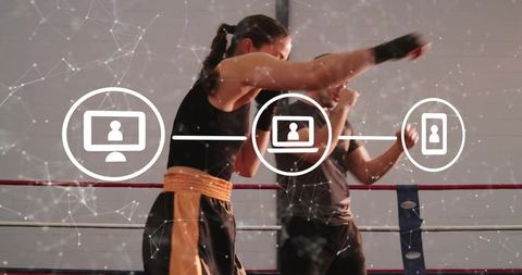 Female boxer sparring in ring, punching during training with digital network and device icons