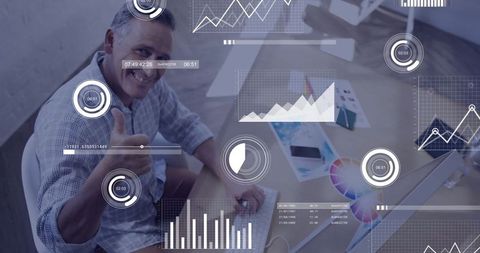 Businessman Analyzing Data with Thumbs-Up in Modern Office