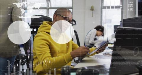 Professional Analyzing Data in Modern Office Environment