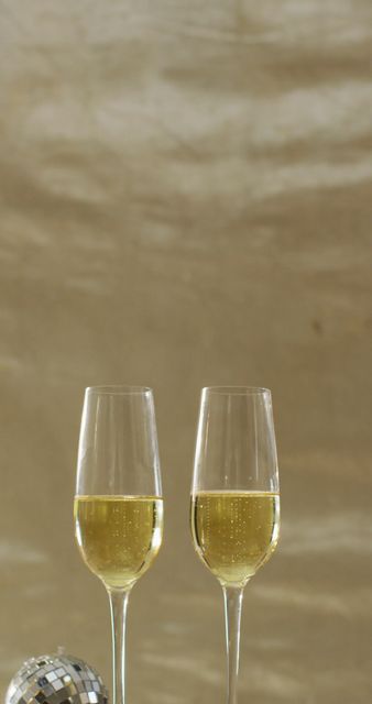 Two Champagne Glasses Celebrating with Mini Disco Ball - Download Free Stock Images Pikwizard.com