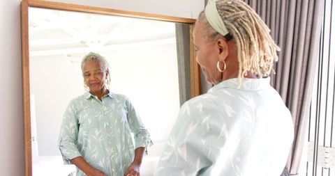 Graceful Senior African American Woman Reflected in Mirror - Download Free Stock Images Pikwizard.com