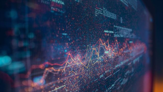 Futuristic data analytics on curved monitor with vibrant line graphs
