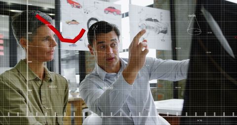 Business team analyzing data with digital overlay in office