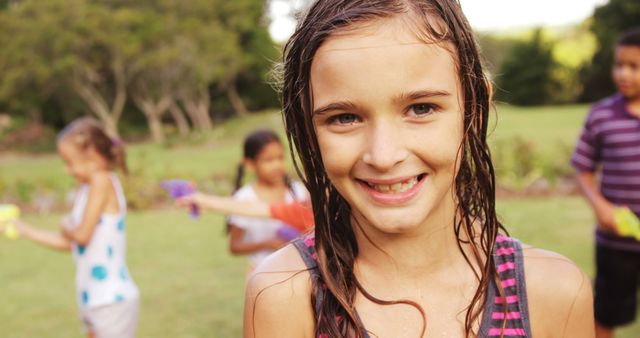 Smiling Girl After Water Fight Enjoying Summer Playtime - Download Free Stock Images Pikwizard.com