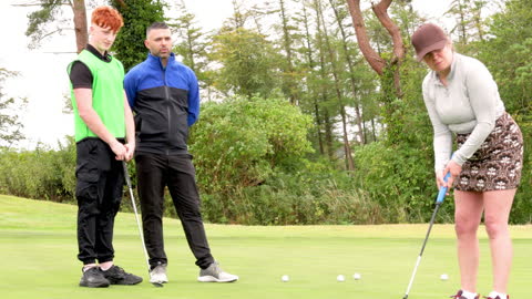 Golfers Focusing on Putting Technique during Practice