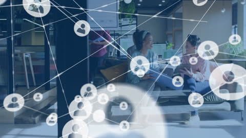 Diverse Professionals Networking in Modern Office