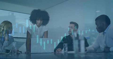 Presenting leader guiding team through financial charts and data analytics in boardroom
