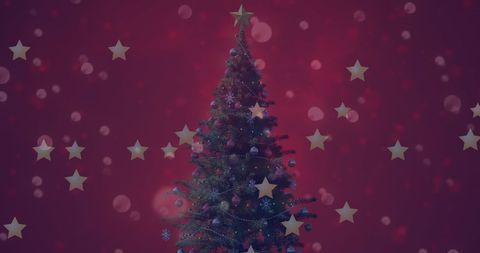 Festive Christmas Tree with Golden Stars on Red Background