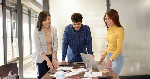 Diverse Team Collaborating in a Modern Office on Business Strategy