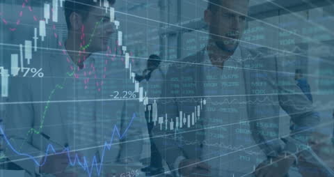 Businesspeople Analyzing Financial Charts in Modern Office