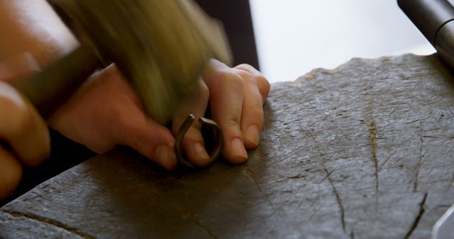 Close-up of Craftsman Hammering Metal in Workshop - Download Free Stock Images Pikwizard.com