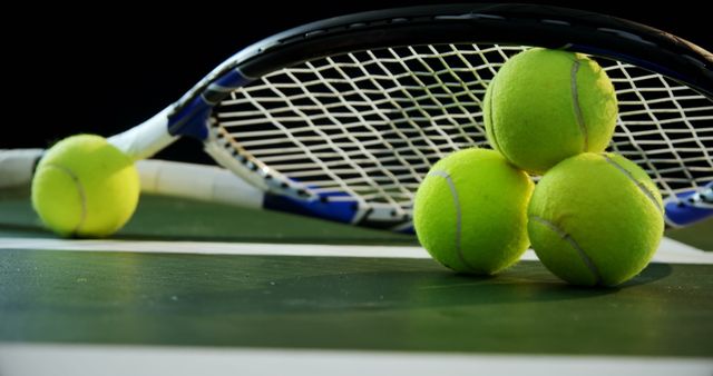 Tennis Racket and Balls on Court Surface in Evening Light - Download Free Stock Images Pikwizard.com