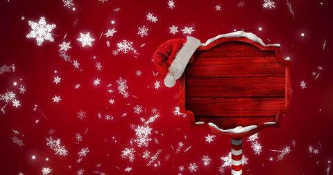 Festive Christmas Sign with Santa Hat on Red Background