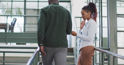 Professional Colleagues Networking in Office Stairway