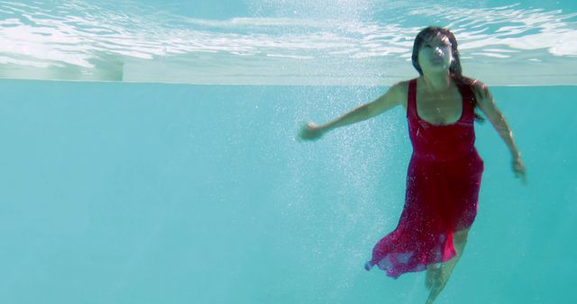 Woman in Red Dress Swimming Underwater - Download Free Stock Images Pikwizard.com