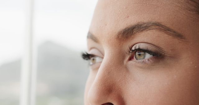 Close-Up of Person's Eyes with Distant Gaze - Download Free Stock Images Pikwizard.com