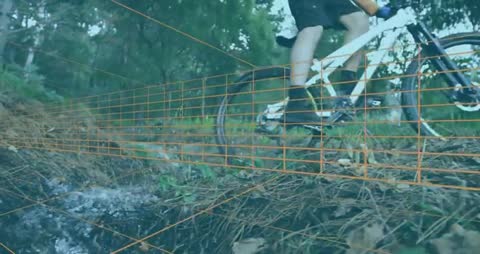 Cyclist Pedaling on Forest Trail with Fitness Analytics Overlay