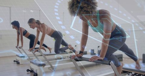 Women Practicing Pilates with Digital Interface Overlay