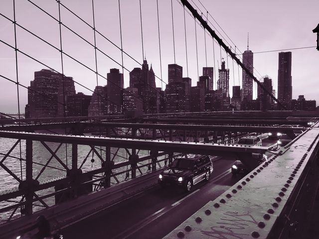 Evening Traffic on Brooklyn Bridge with Manhattan Skyline - Download Free Stock Photos Pikwizard.com