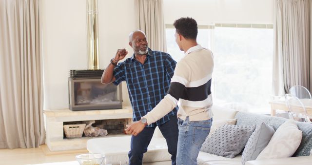 Father and Son Dancing in Living Room - Download Free Stock Images Pikwizard.com