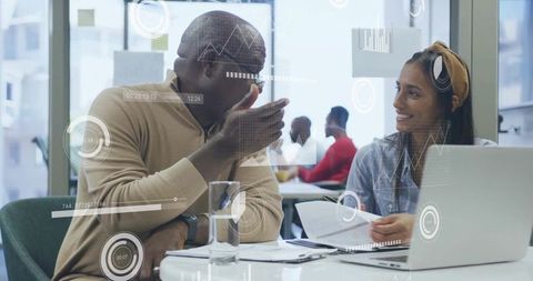 Diverse Professionals Collaborating with Digital Data Overlays