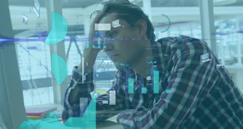 Stressed Businessman Analyzing Digital Financial Data in Office