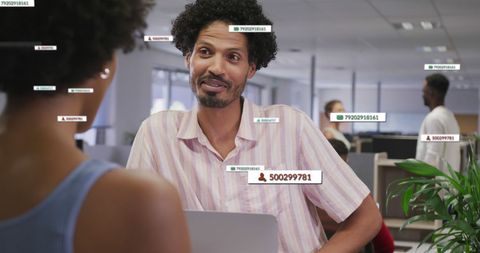 Financial Data Overlay on Diverse Business Team in Office