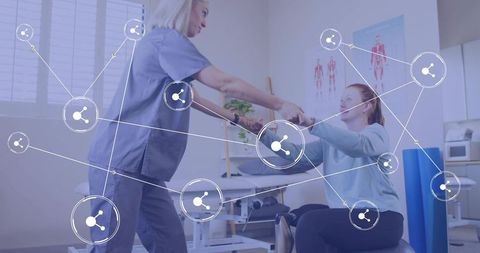 Therapist Assisting Patient with Physiotherapy Exercises