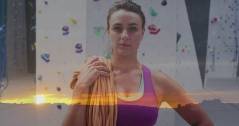 Empowered Focus: Woman with Climbing Rope and Sunset