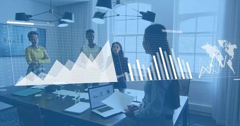 Team Analyzing Data and Presenting Interactive Digital Charts in Bright Modern Boardroom