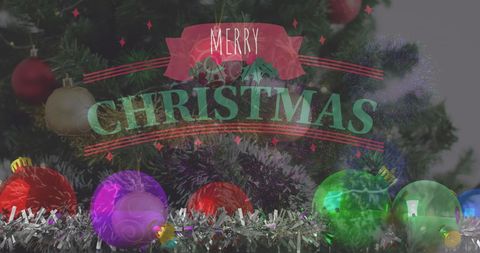 Merry Christmas Sign Amidst Festive Ornament Decor