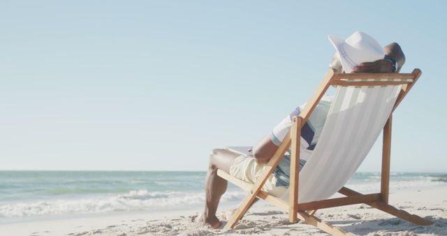 Relaxing on Beach Chair by Ocean - Download Free Stock Images Pikwizard.com