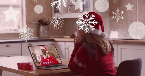 Virtual Christmas Celebration with Santa Hat and Festive Snowflakes