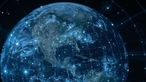 Glowing digital earth spinning in virtual cyberspace