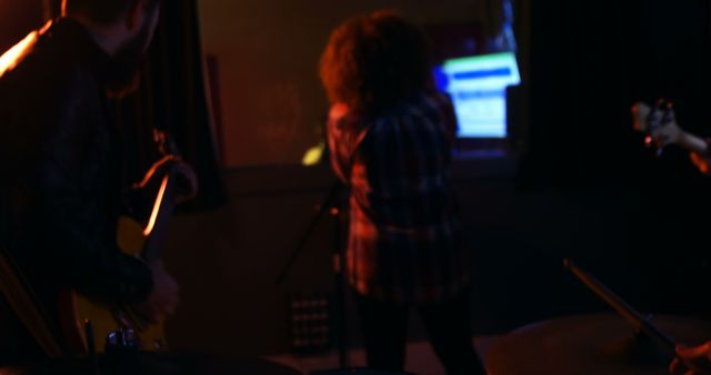 Band performing in recording studio