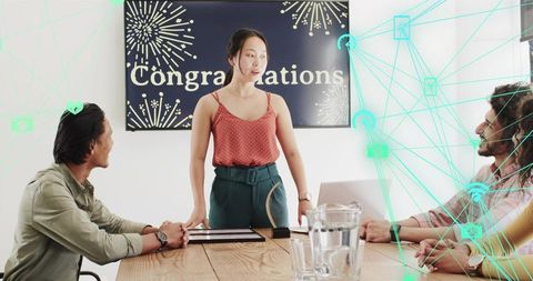 Presenting team award at office celebration with ar overlay and congrats banner