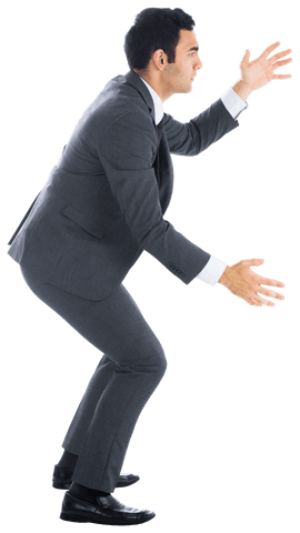 Focused Asian Businessman Holding Something on Transparent Background - Download Free Stock Videos Pikwizard.com