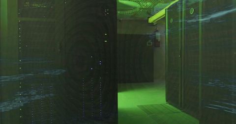 Illuminated datacenter corridor with server racks and led lights